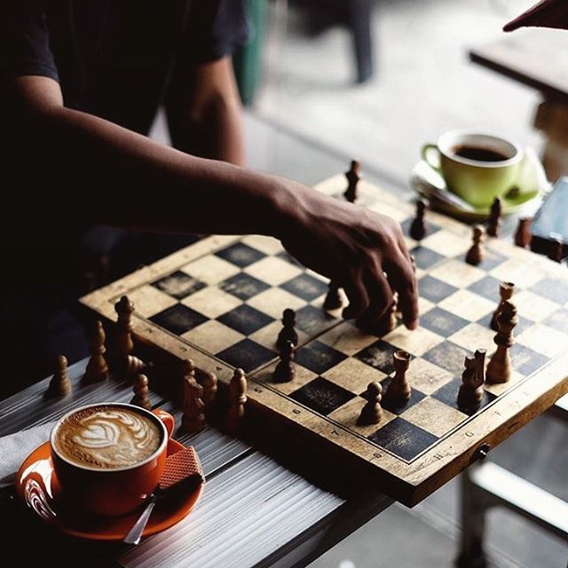 Chess game in a cozy coffee shop